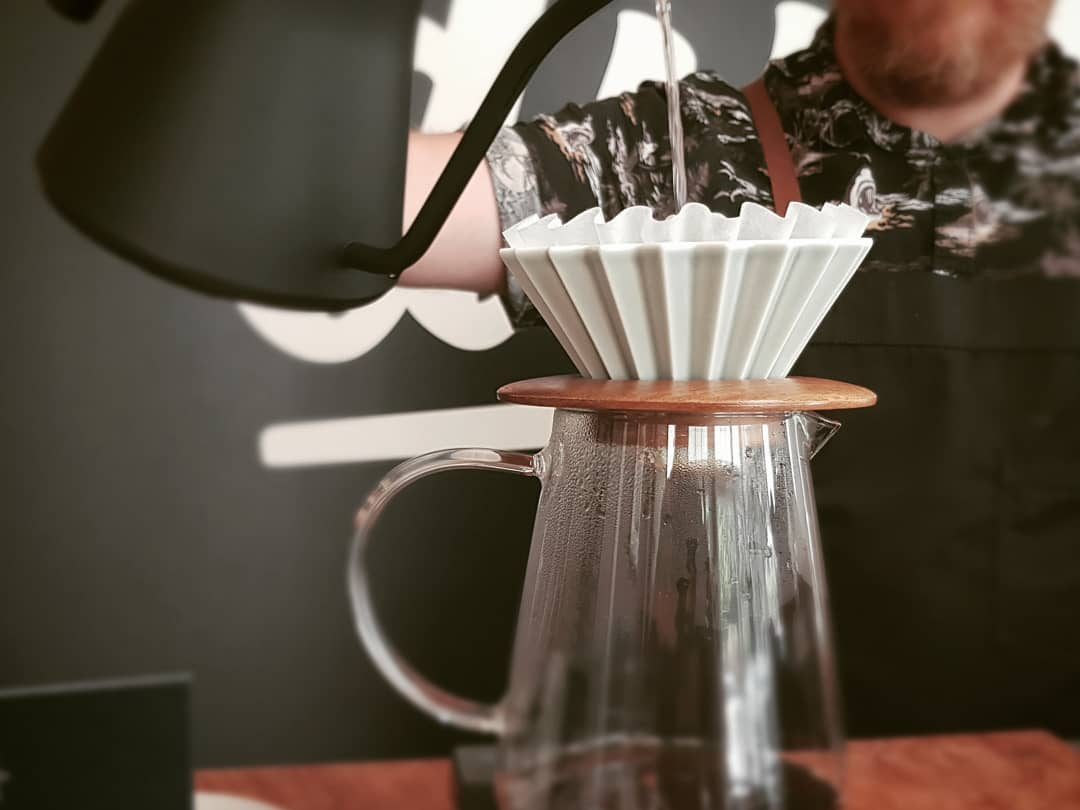 Filtering coffee at Dinki